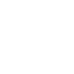 A white rocking horse is sitting on the ground.